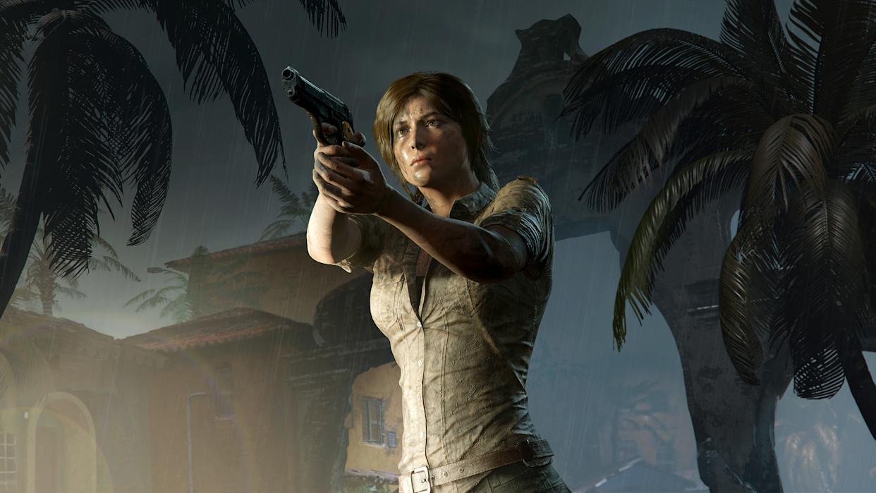 A screenshot from Crystal Dynamic's Shadow of the Tomb Raider. A dirt covered Lara Croft holds a pistol towards someone off screen.